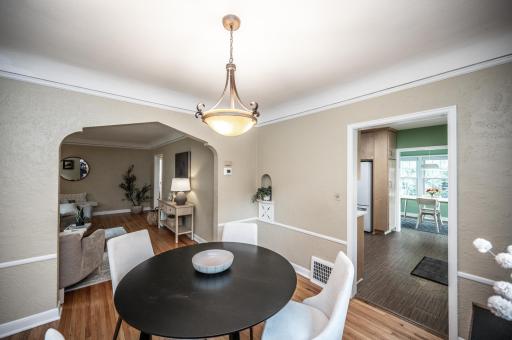 The formal dining room opens to the kitchen and living room