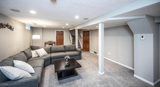 The family room is large enough for movie night, games, and more