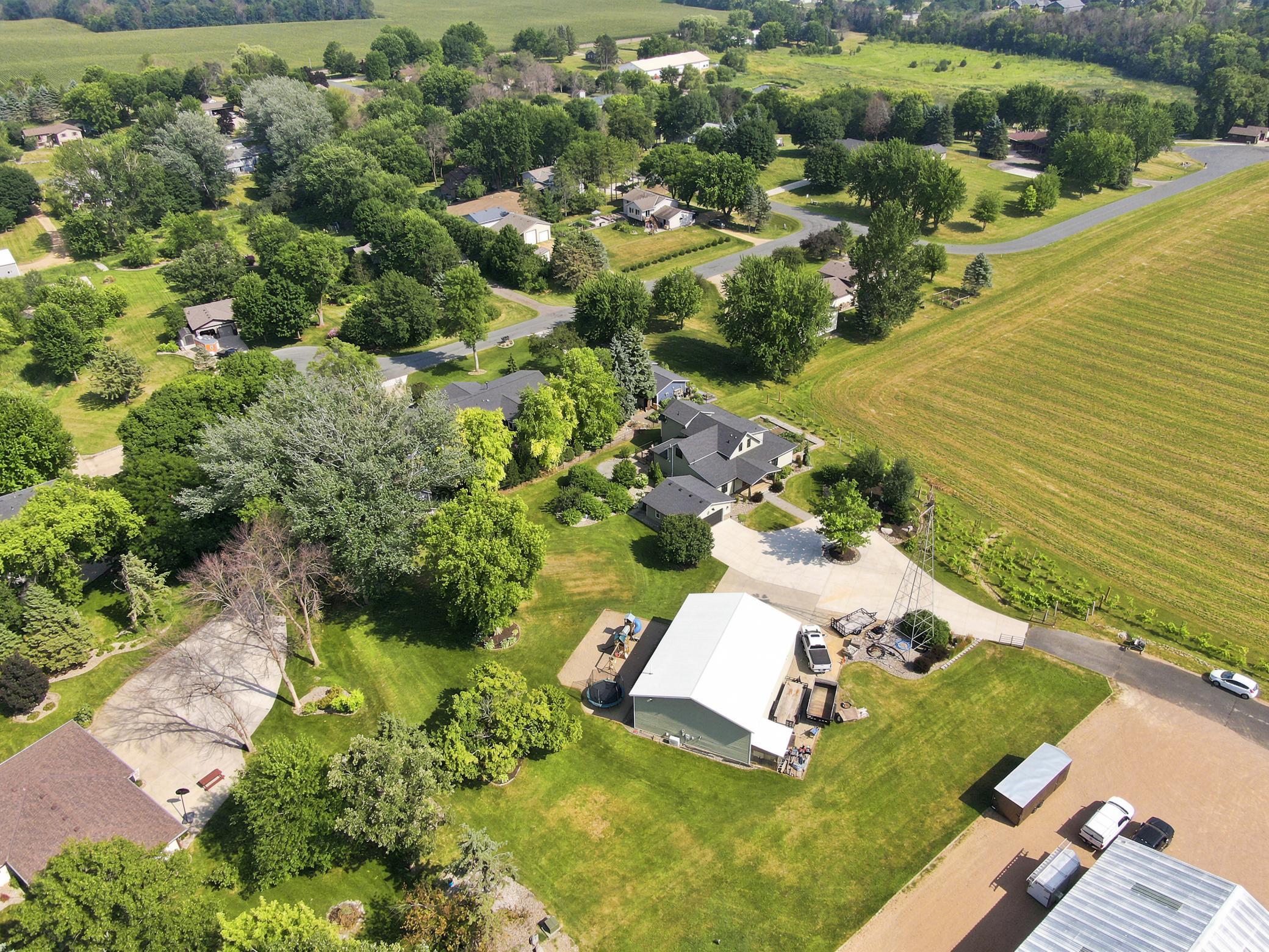 This breathtaking property features a beautifully updated home, a detached garage, a massive outbuilding, and its own private vineyard nestled on a sprawling lot with sweeping countryside views.