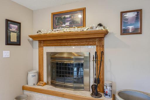 The family room features a wood-burning fireplace.