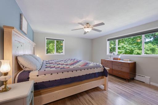The primary bedroom features a walk-in closet and durable LVP flooring.