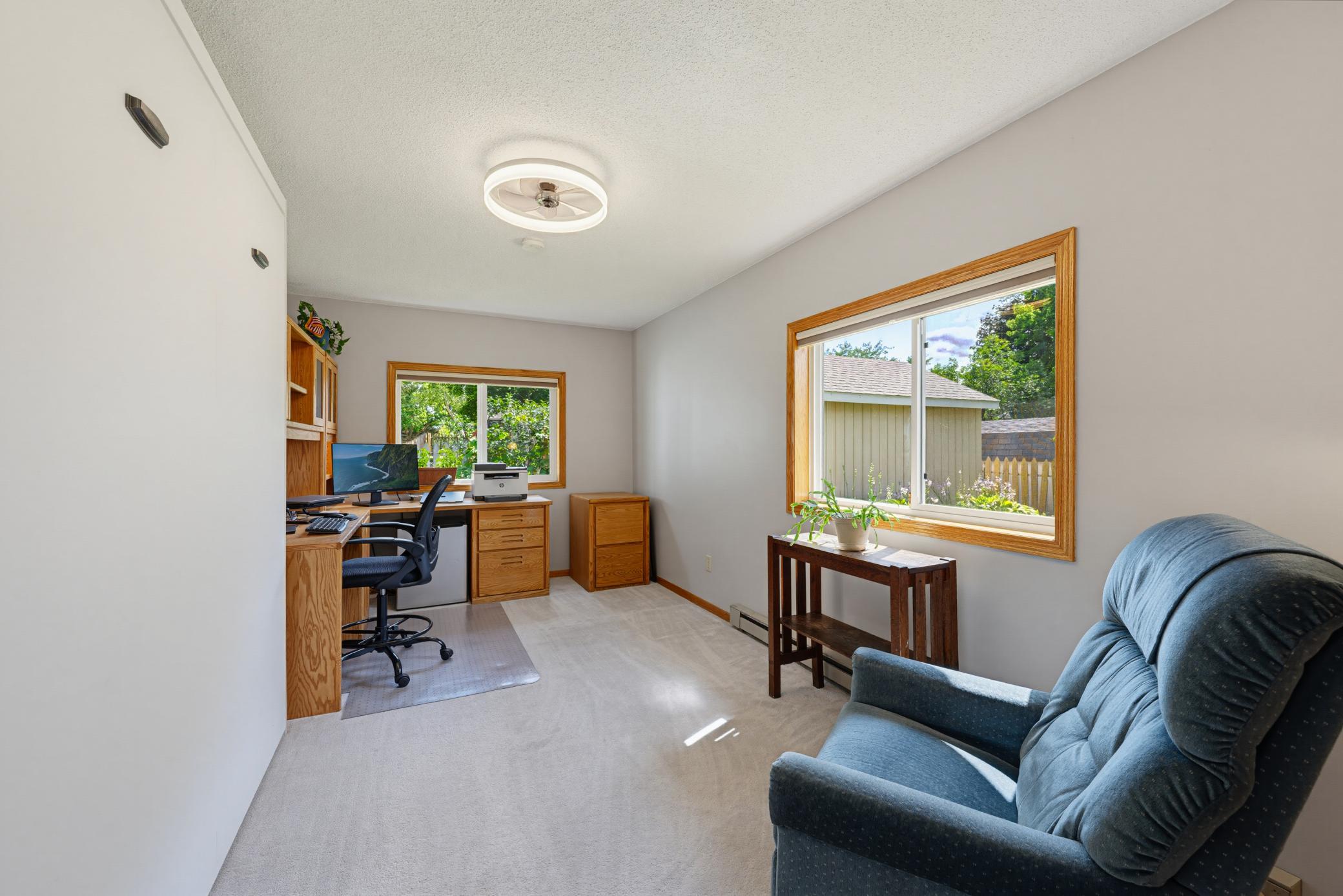 The third bedroom on the main floor is currently being used as a home office.