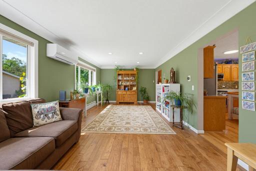 Situated right off of the kitchen, this expansive space could also be used as a formal dining room.