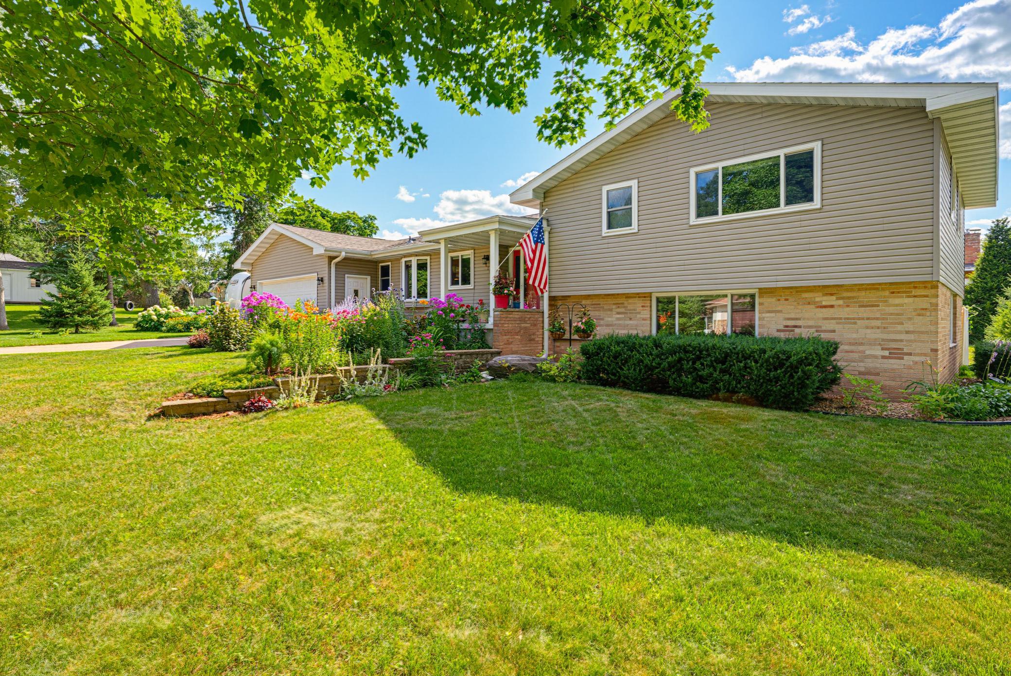 Welcome to this 4 bed 3 bath home nestled on a quiet street in desirable SW Hutchinson.