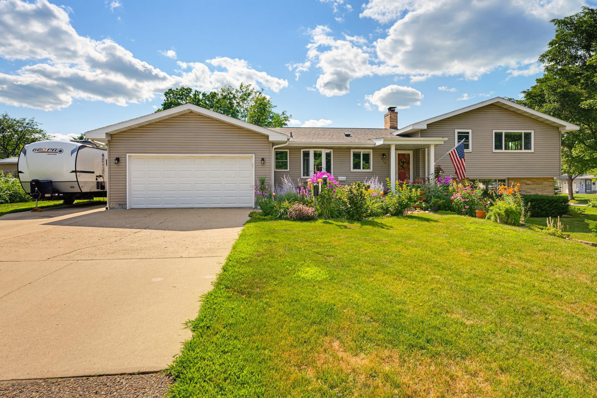 Welcome to this 4 bed 3 bath home nestled on a quiet street in desirable SW Hutchinson.