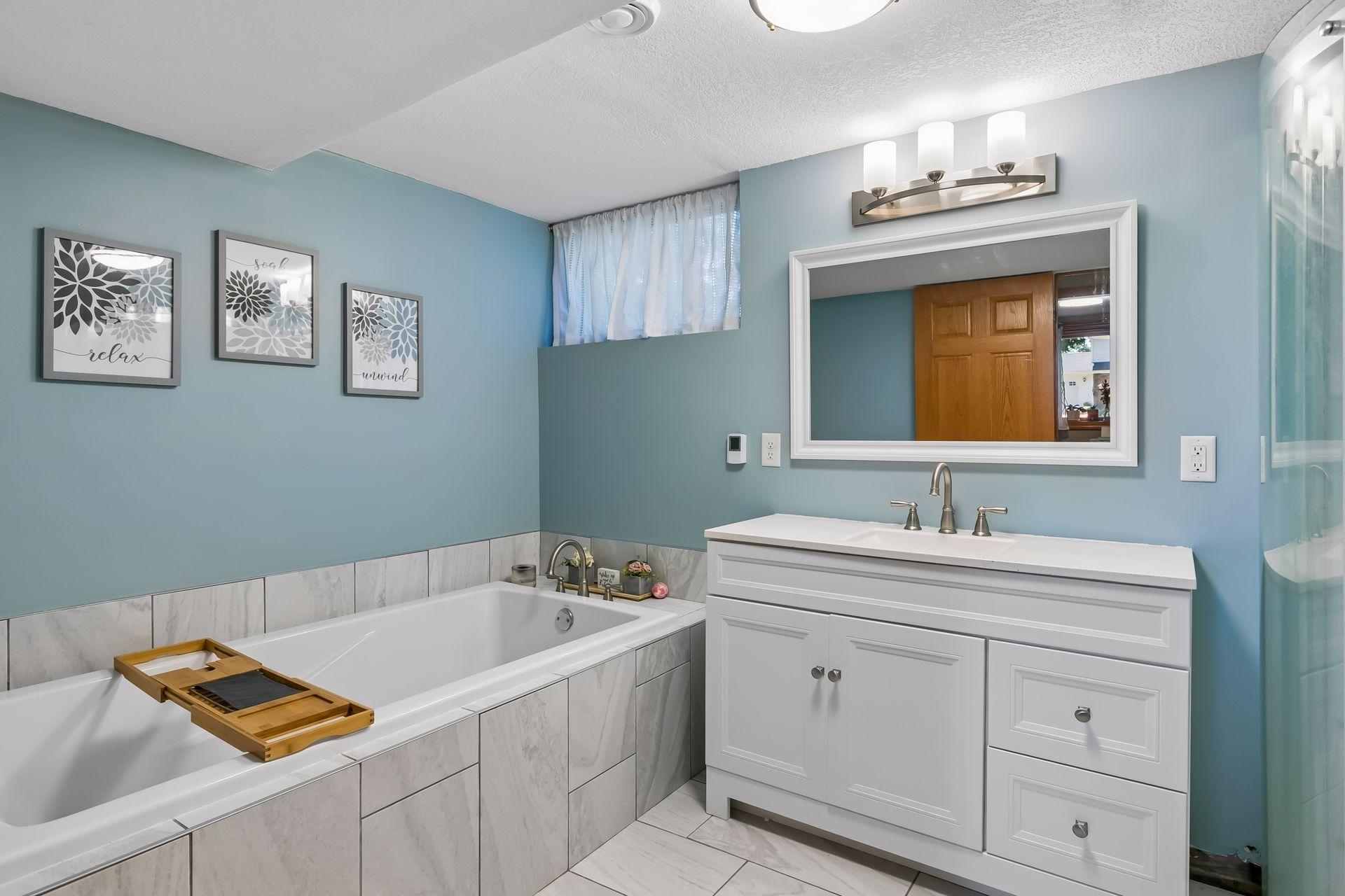 Newly updated lower level bathroom with in floor heat