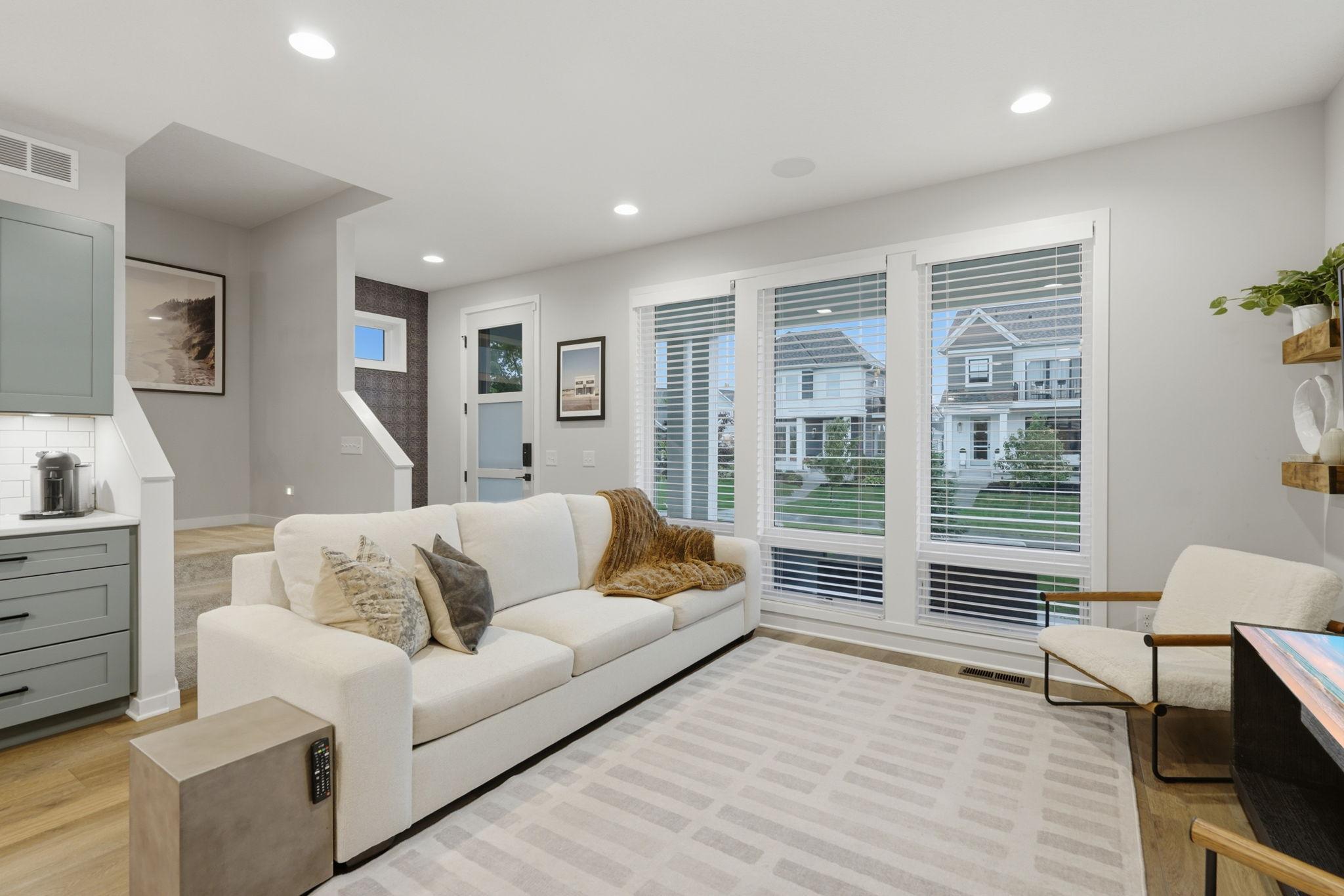 Living room with floor to ceiling windows
