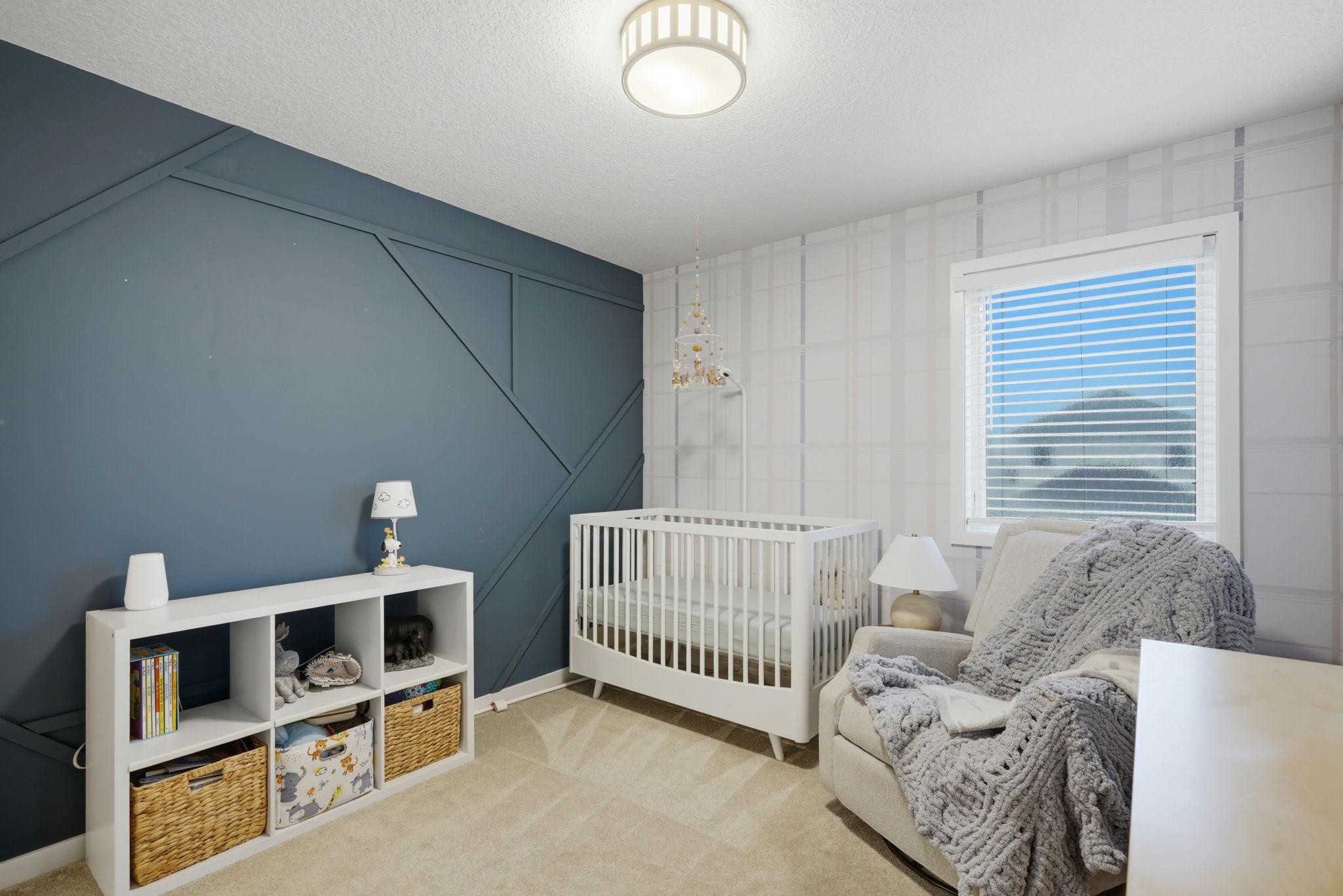 Second Bedroom upstairs with custom accent wall and designer wallpaper