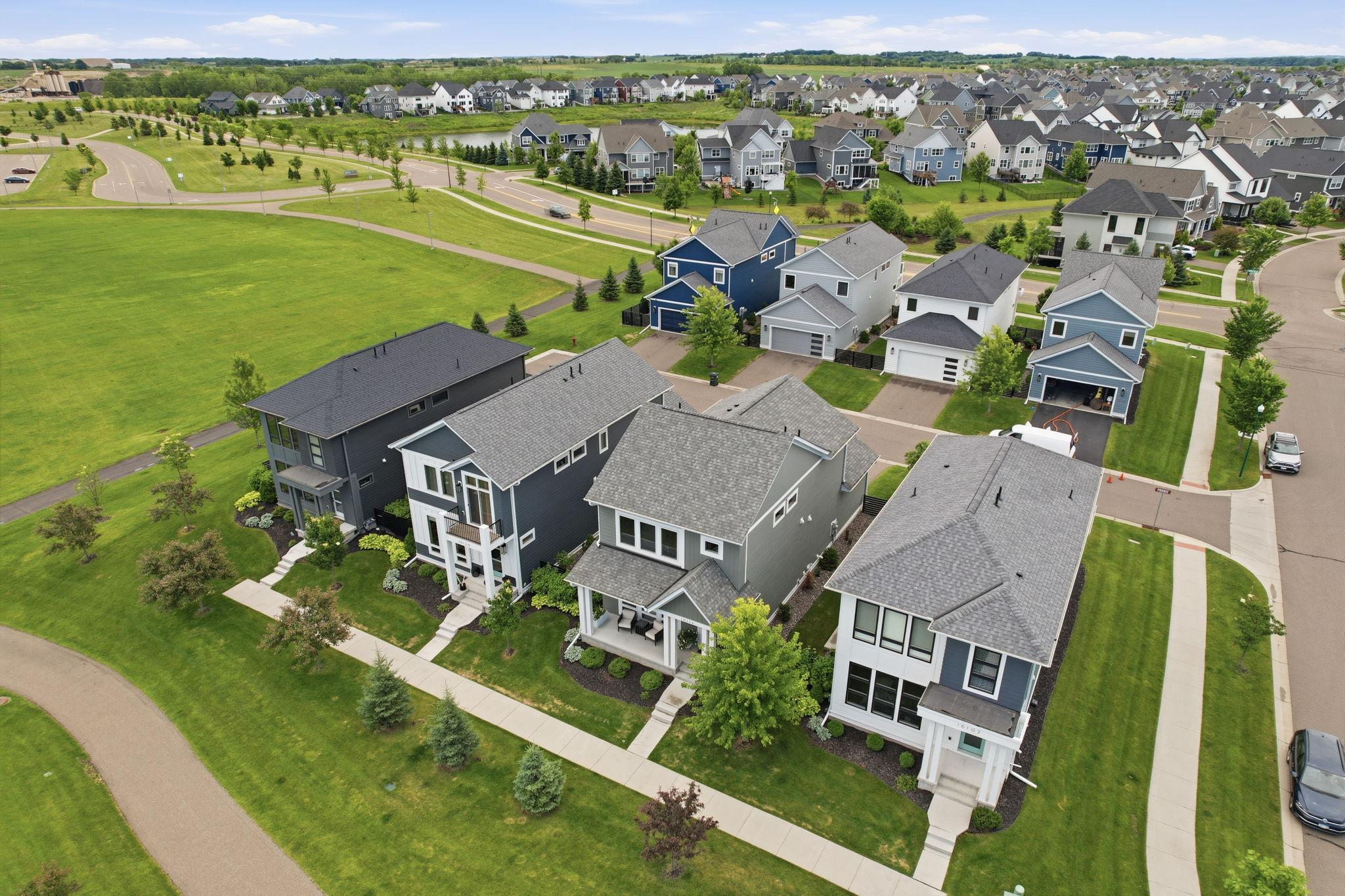 Front yard is private with sidewalk leading to the park