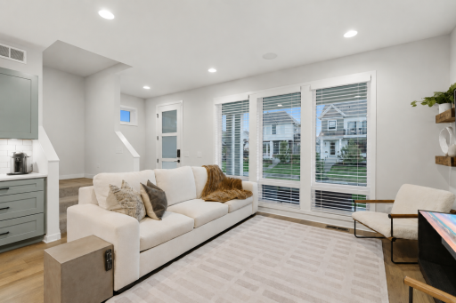 Living room with floor to ceiling windows