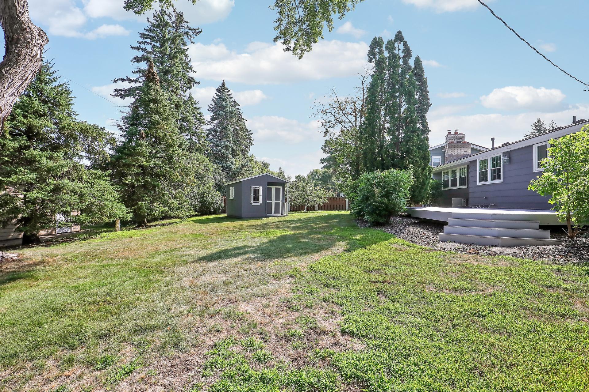 Large backyard with shed