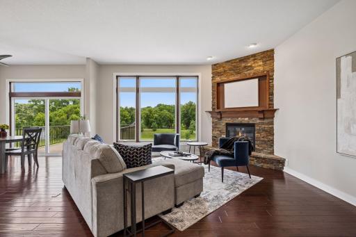 Main floor great room with floor to ceiling stone fireplace. Check out the views!!
