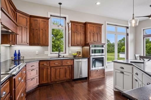 Custom cabinets, tons of storage, and stainless appliances.