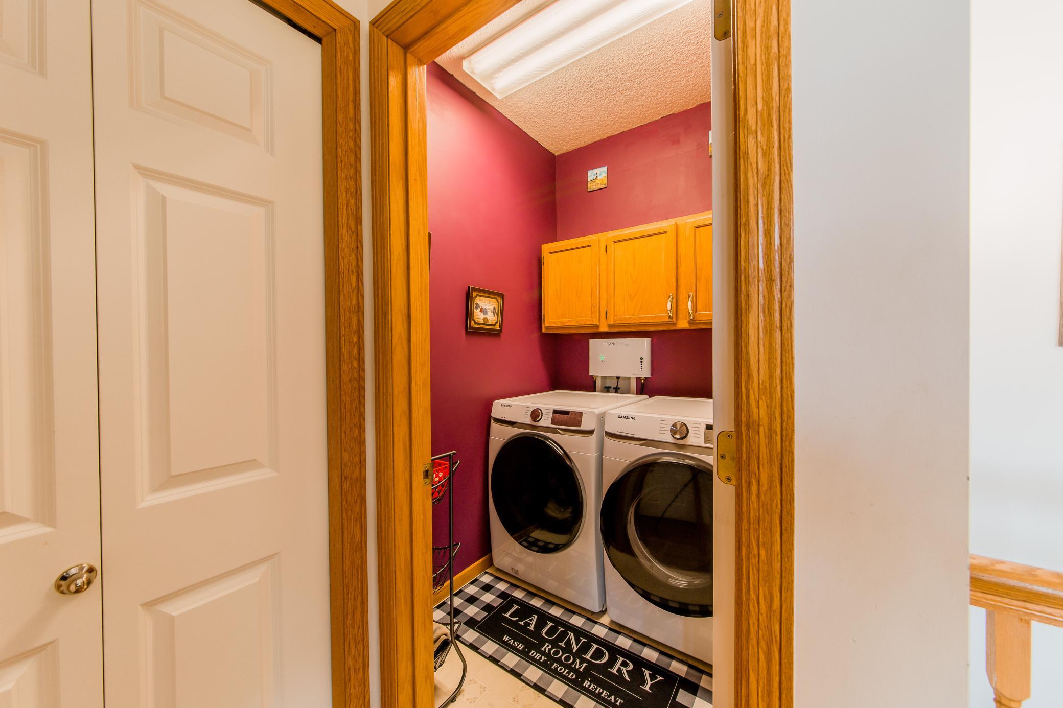 Main floor laundry and linen closet.jpg