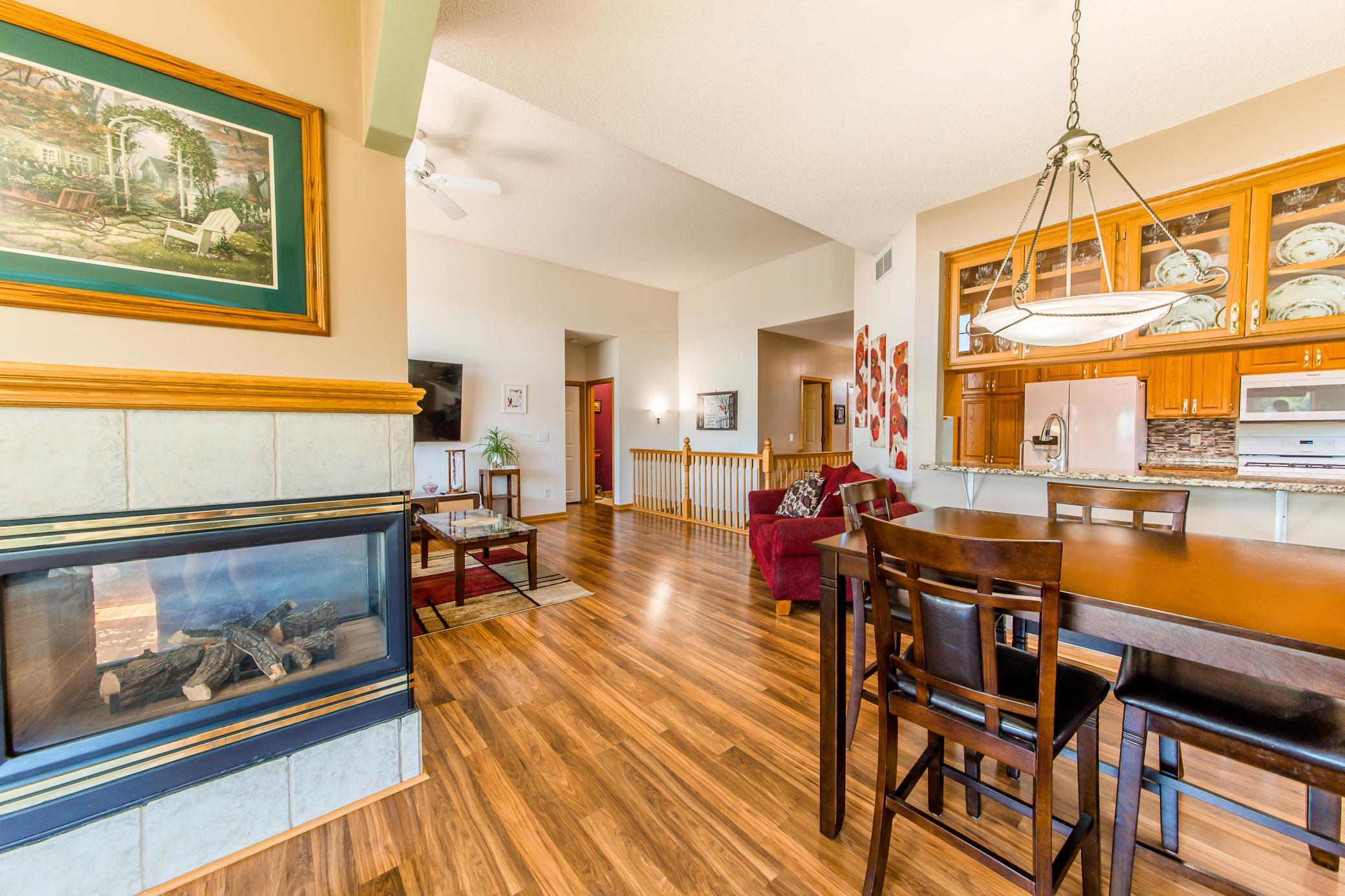 Sun area and living room seperated by fireplace .jpg