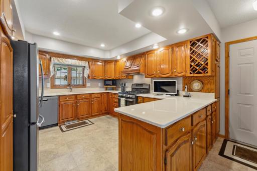 The tastefully updated kitchen easily accommodates the family that cooks together!