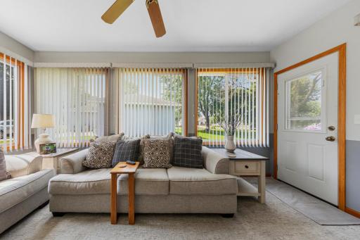 The door off the sunroom leads to a small deck for enjoying time outside!