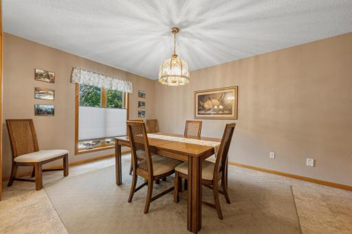A more formal dining room easily accommodates a larger table set for holiday gatherings!