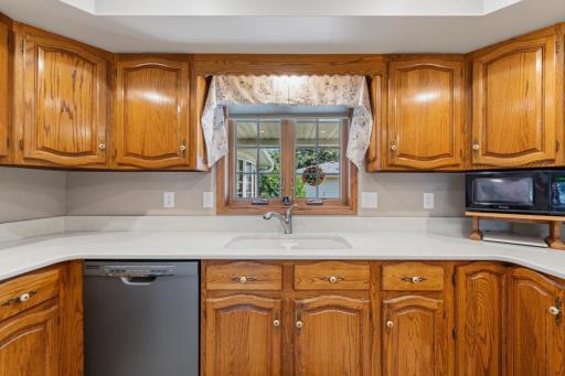 A kitchen window overlooking the front entrance and gardens!