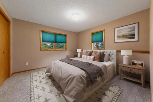 Lower level fourth bedroom. (Virtually staged.)