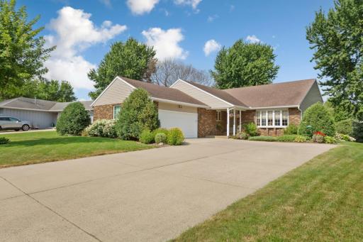 The low-maintenance concrete driveway offers a generous amount of off-street parking for visiting friends and family!