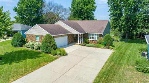 The curb appeal of the architecture and the well-maintained landscaping welcome you home!