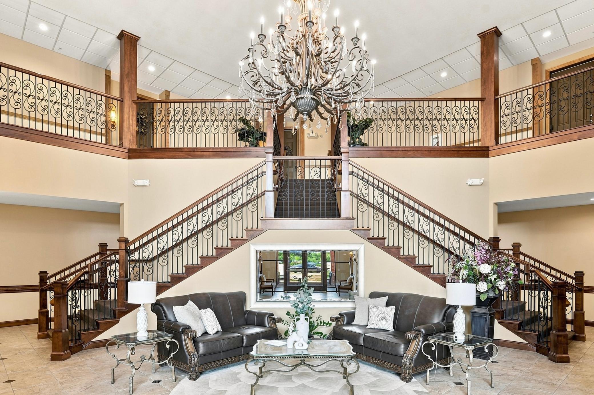 Grand Foyer w/double stair case