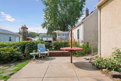 Private backyard patio provides outdoor space for relaxing, grilling, gardening, or summer entertaining.