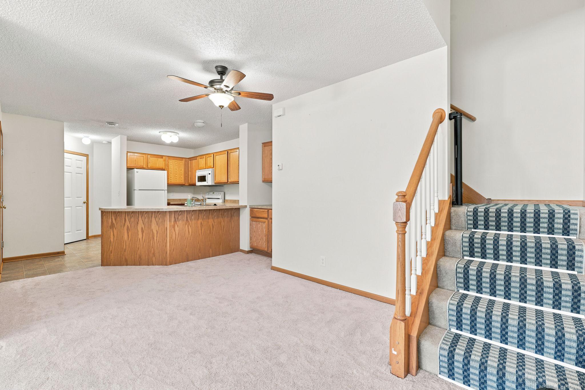 Kitchen just off of the living room, and easy access to the garage when you head out.