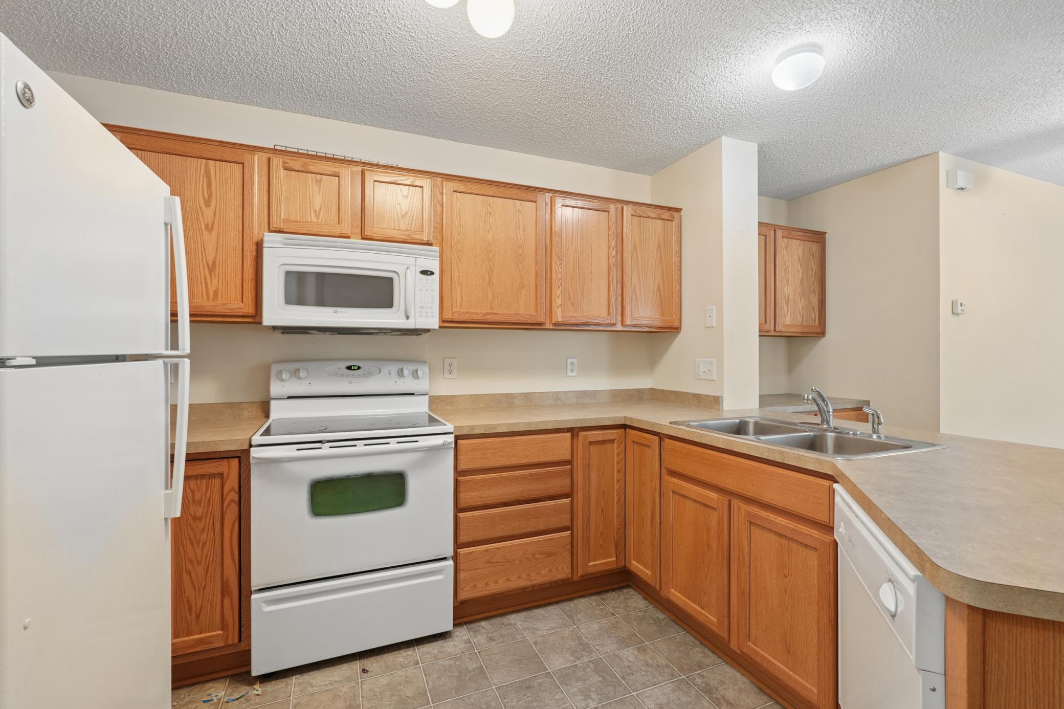 Plenty of cabinet space and counter-tops.