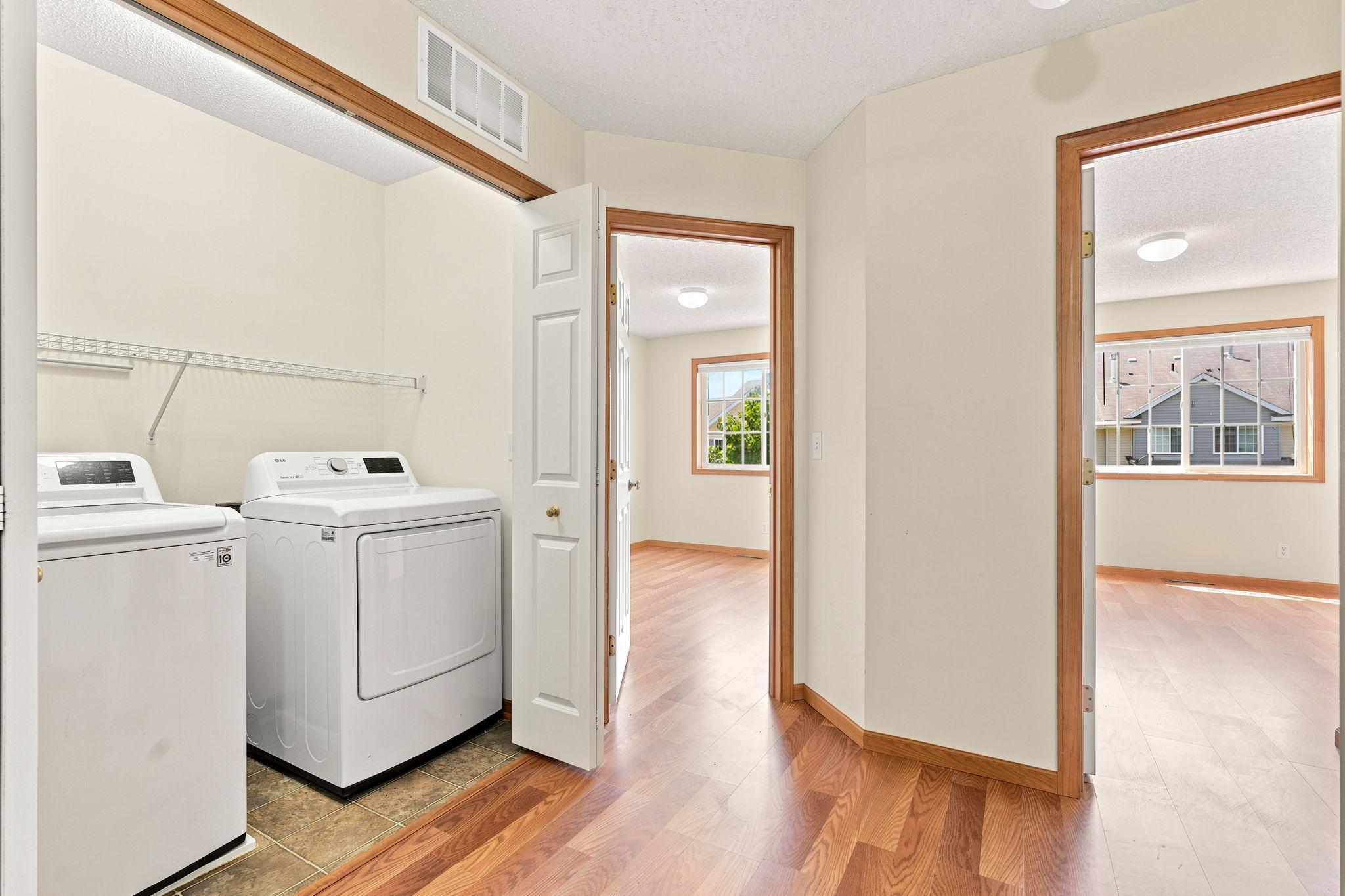 Head upstairs and you will find three spacious bedrooms and a laundry area.