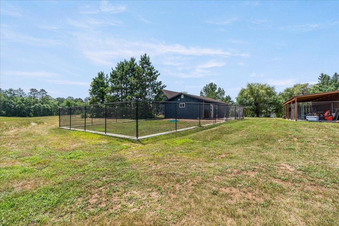 Fenced Yard Surrounding the Garage