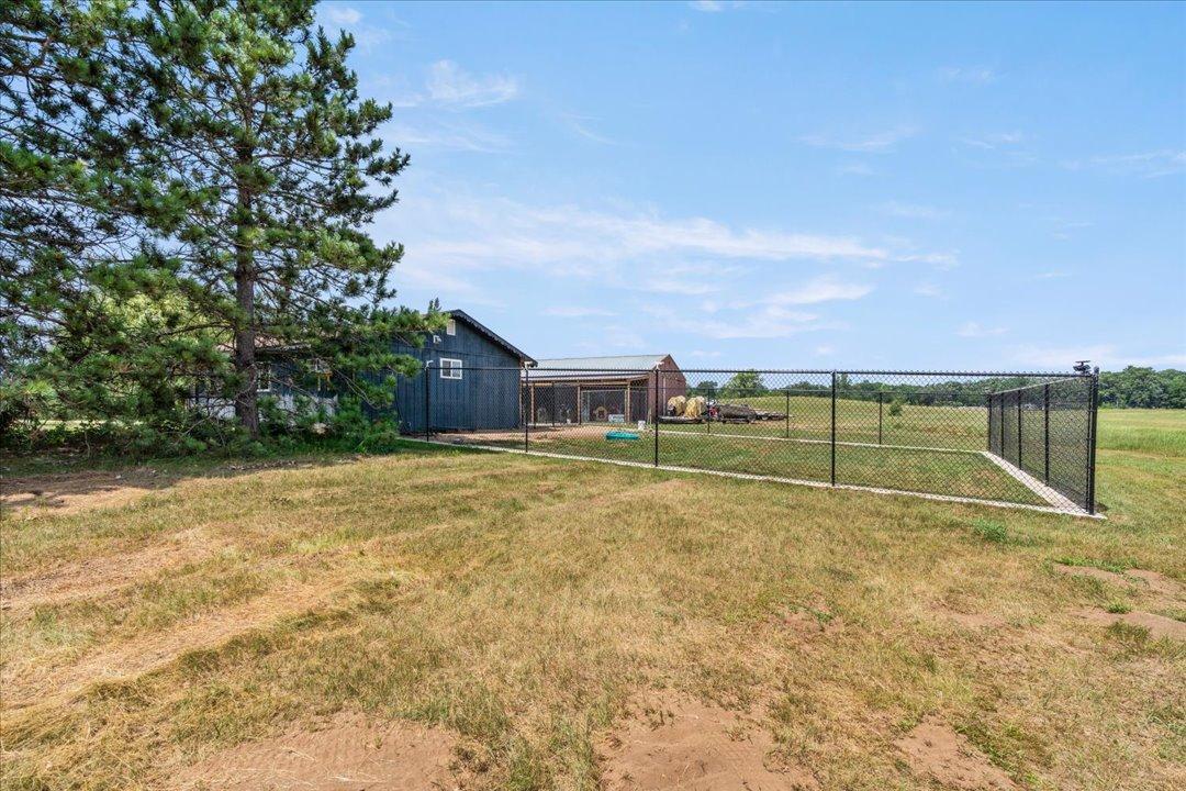 Fenced Yard Surrounding the Garage