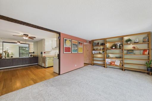 Large LR featuring full wall solid oak bookcase