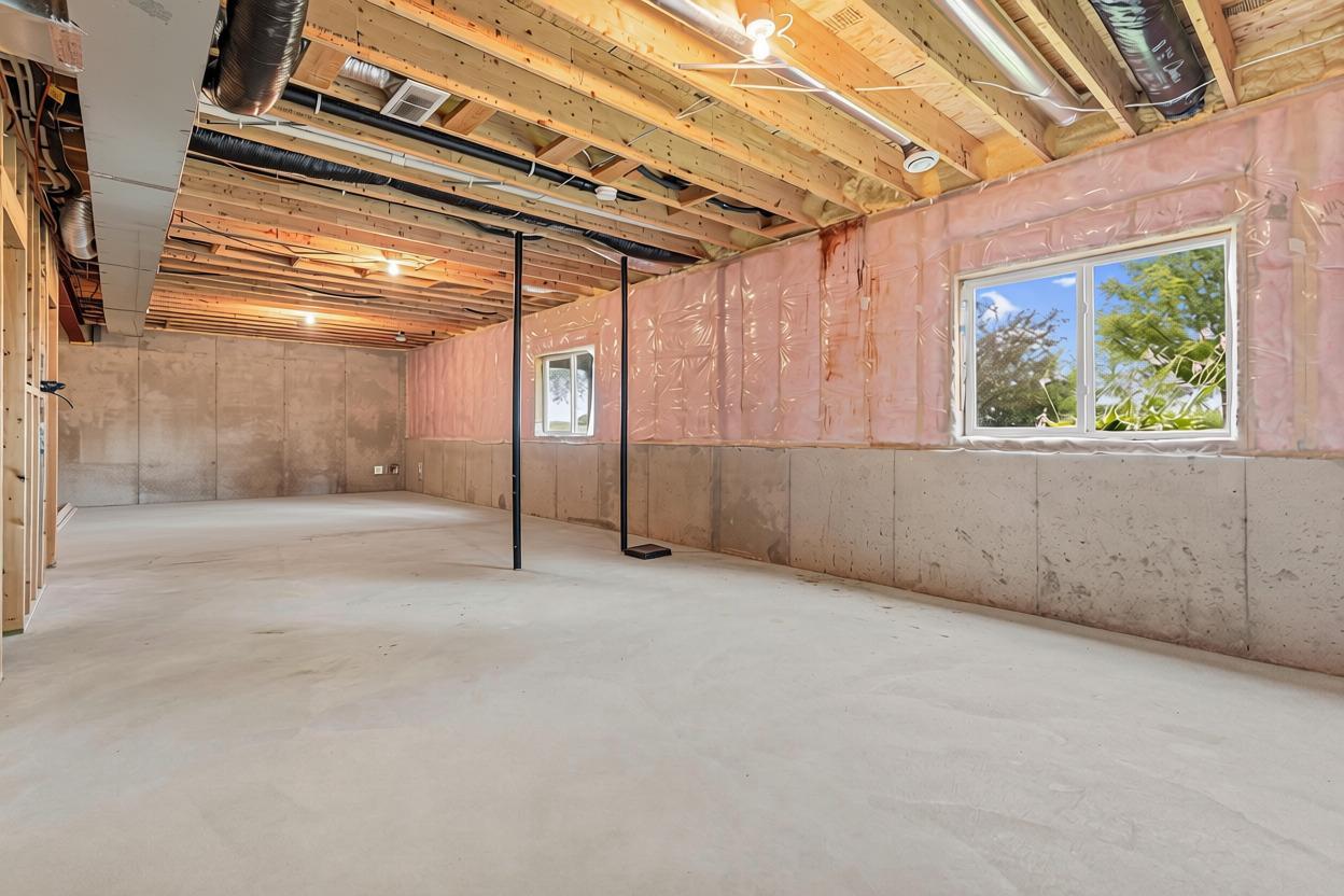 Unfinished lower level has large windows for great sunlight