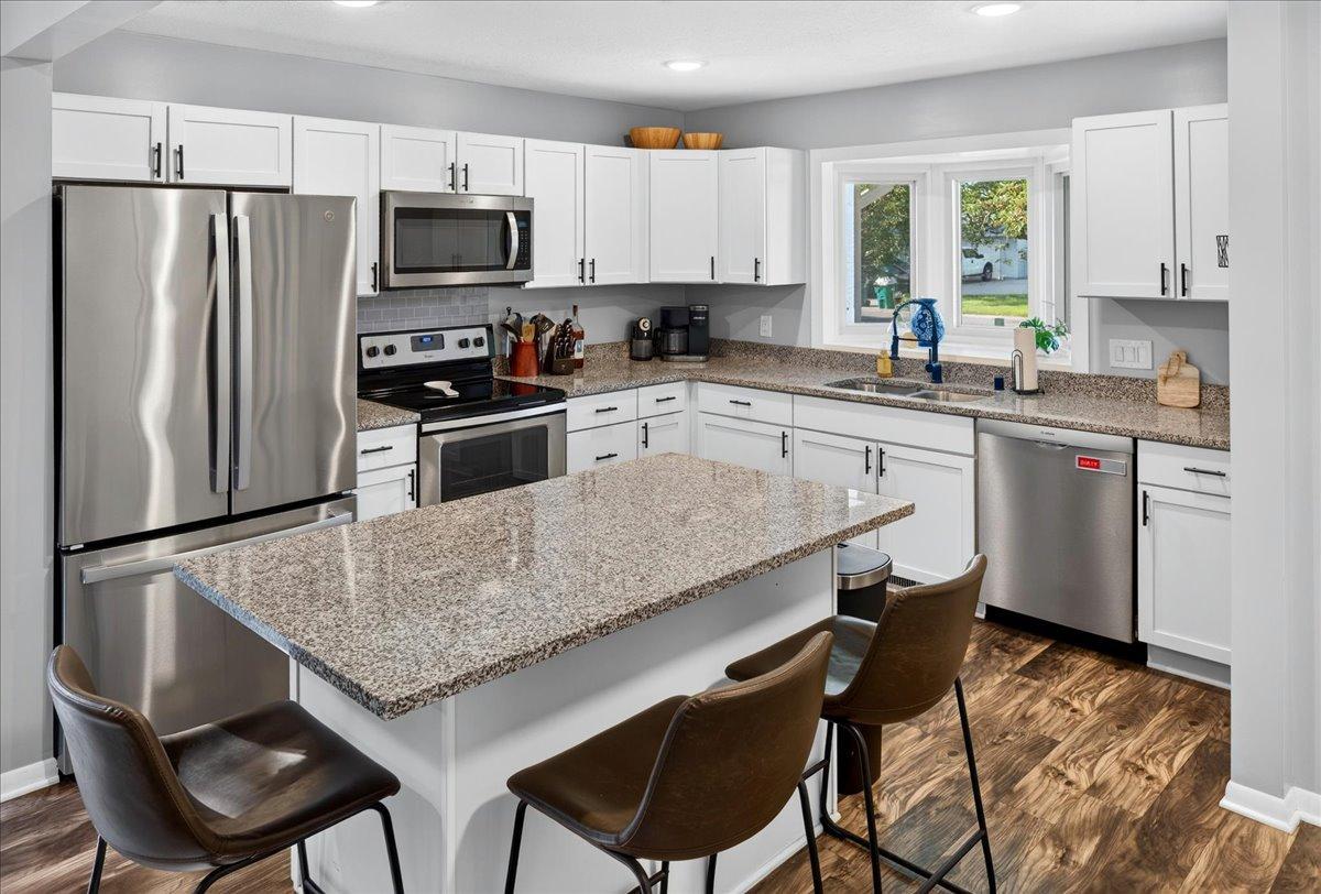 SS appliances and solid surface counter tops