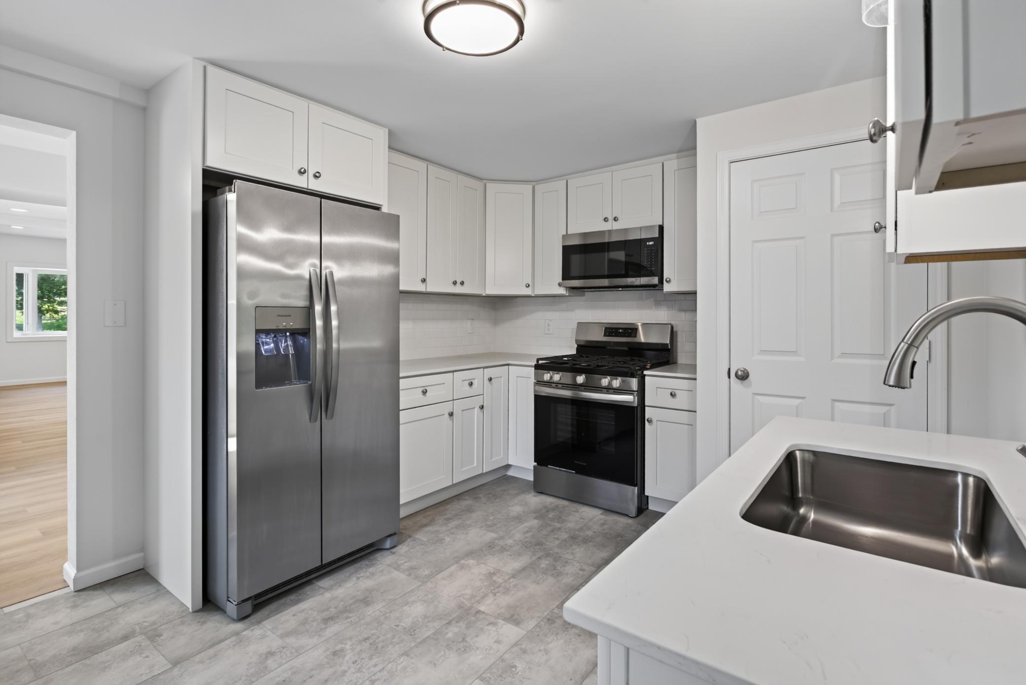 Main level: kitchen (virtually staged)