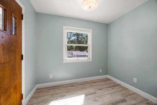Doorway off the kitchen that leads outside to the deck area