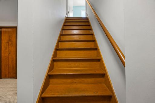 Lower level staircase leading up to the kitchen area
