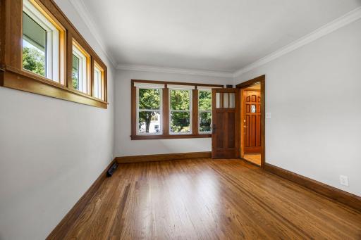 Main level family room with hardwood floors and beautiful view outside