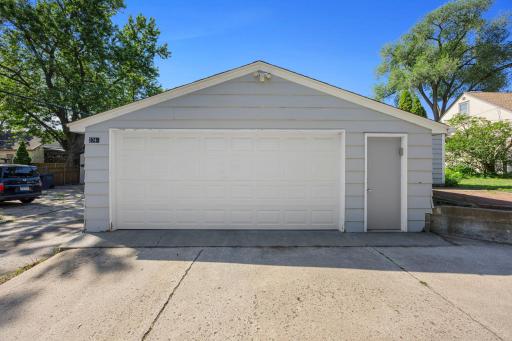 Detached double stall garage with extra outside driveway space