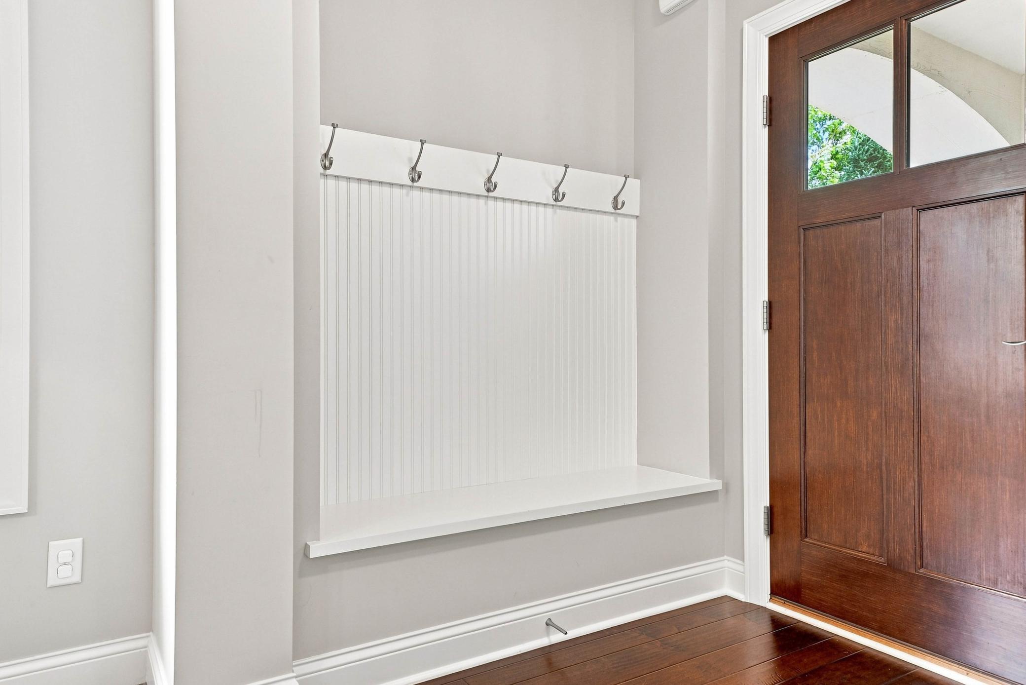 Everyday organization begins in this functional mudroom.