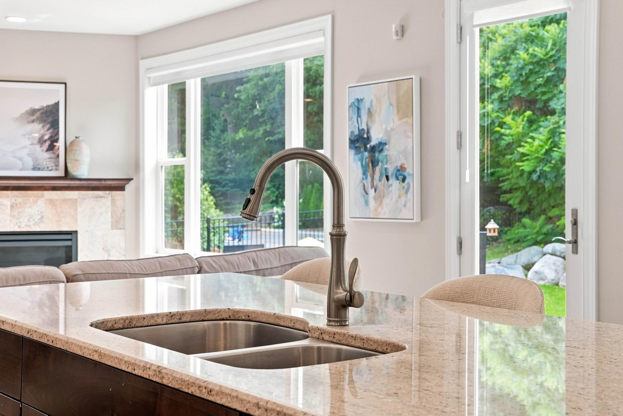 Bright kitchen overlooking the backyard