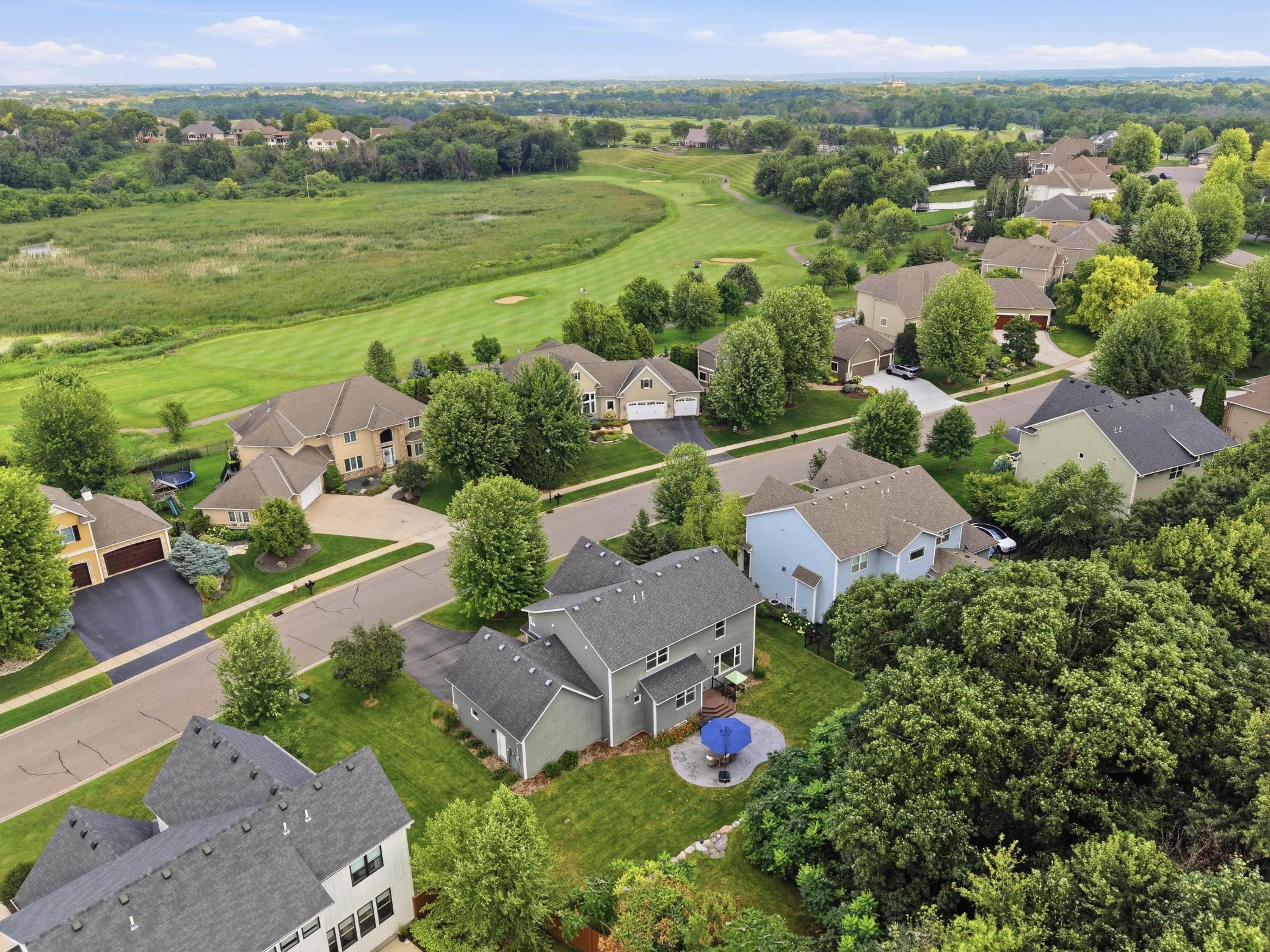 Tree-lined streets create a peaceful neighborhood setting.