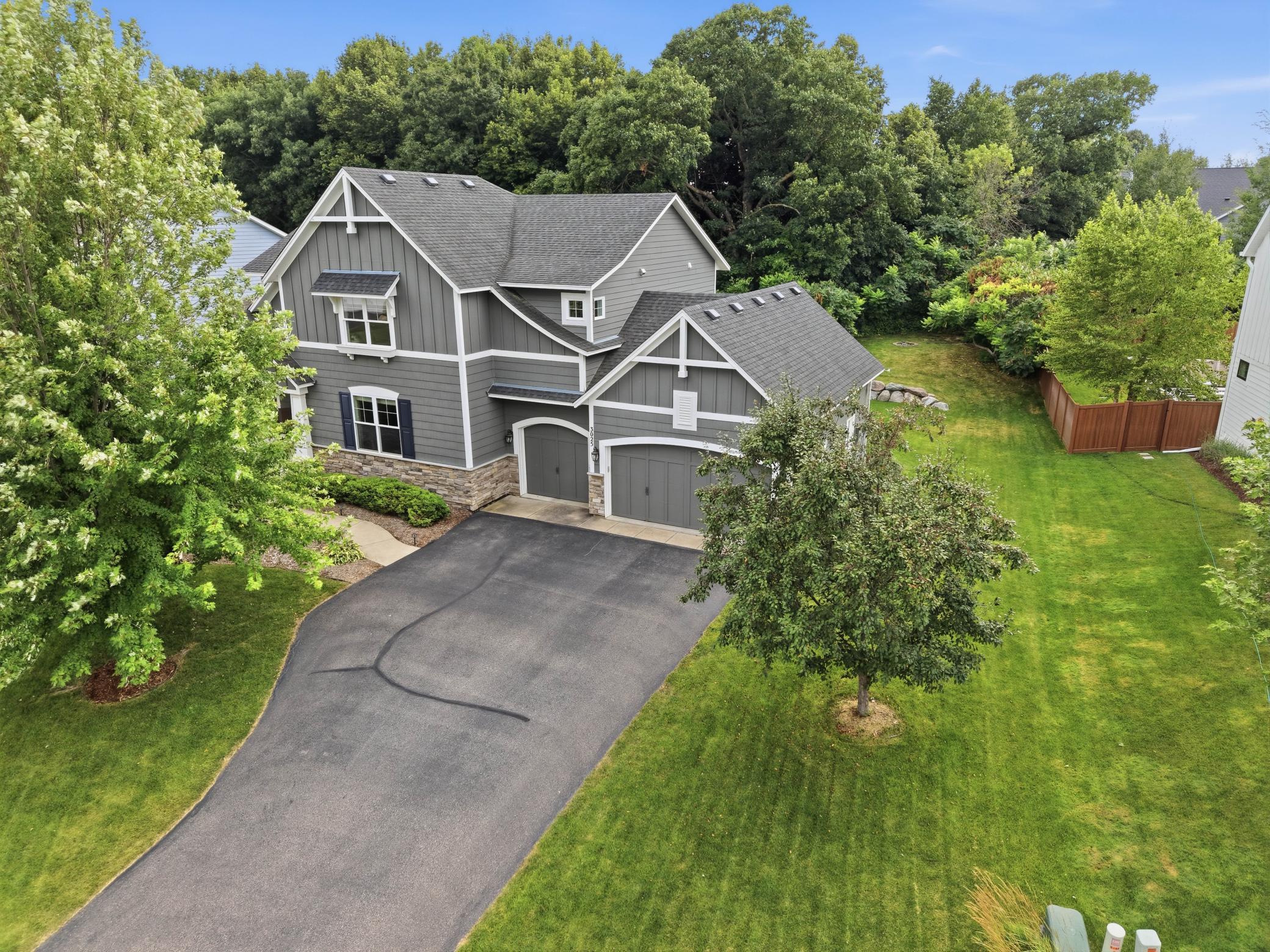 Homes like this don't come along often. A custom-built home in Chaska Town Course offering exceptional quality, functional living spaces, and a private setting just minutes from everything Chaska has to offer.