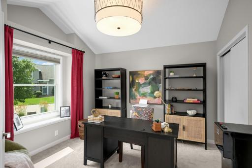 Vaulted front office that can also be a main floor bedroom