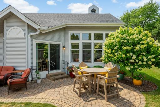 Paver patio that offers perfect design for outdoor table or sitting areaa.
