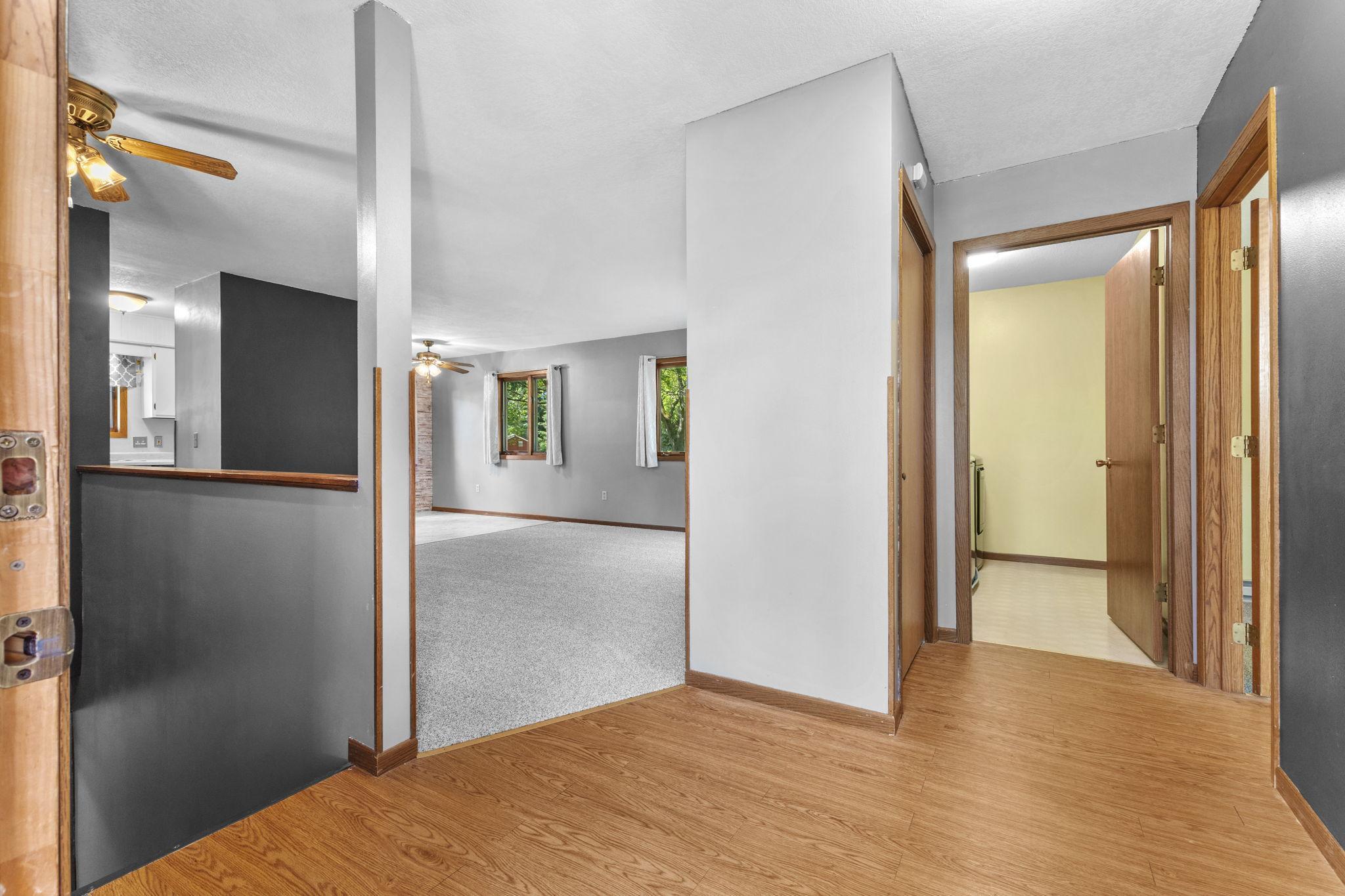 Living room, coat closet and laundry room