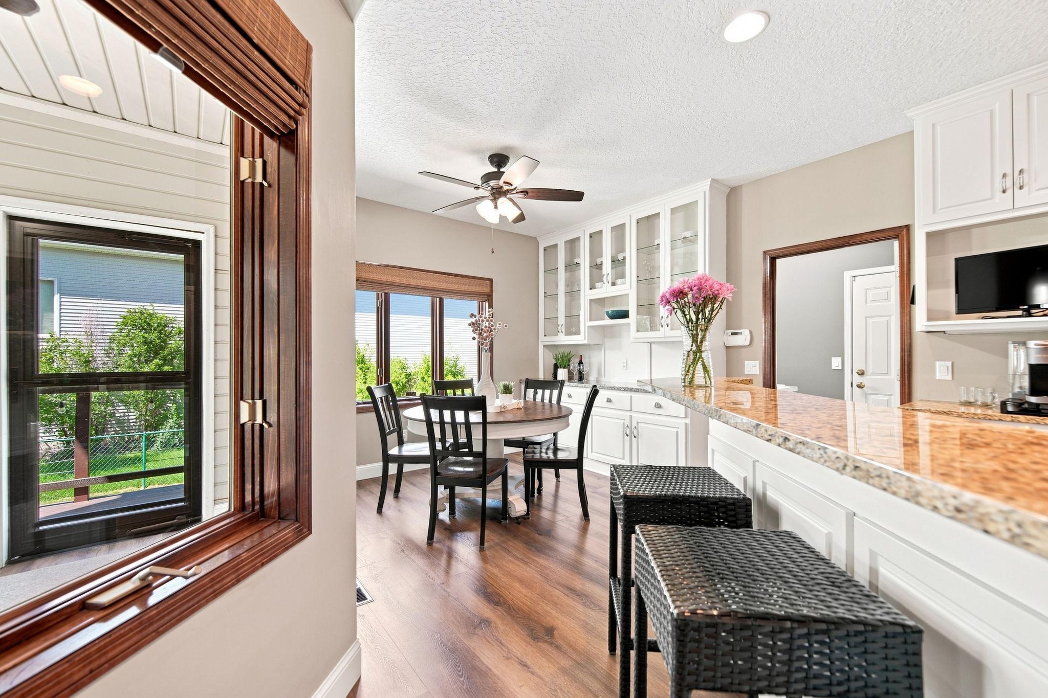 The kitchen serves as the heart of the home, with inviting views to the backyard.