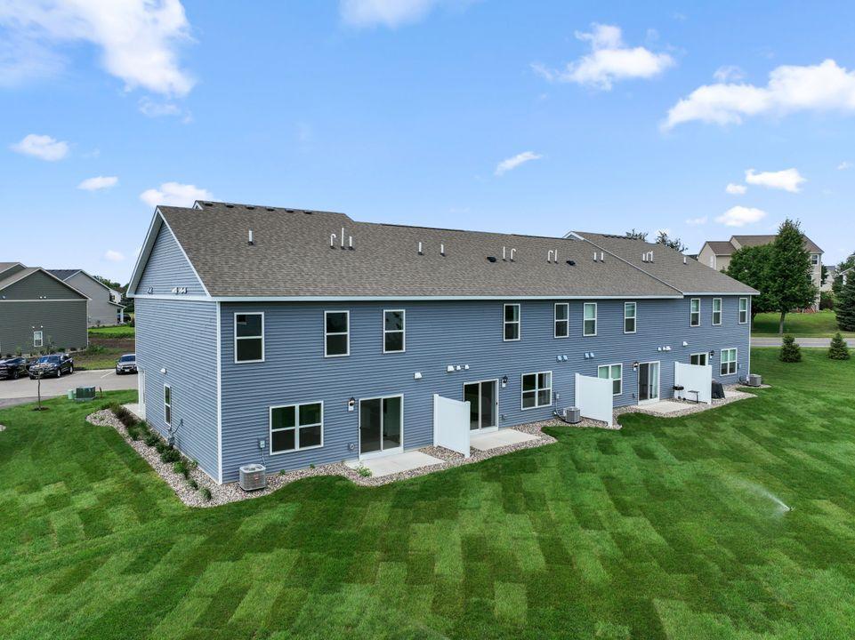 Rear of homes at Ardan Place in Rosemount. Every home has a private patio.